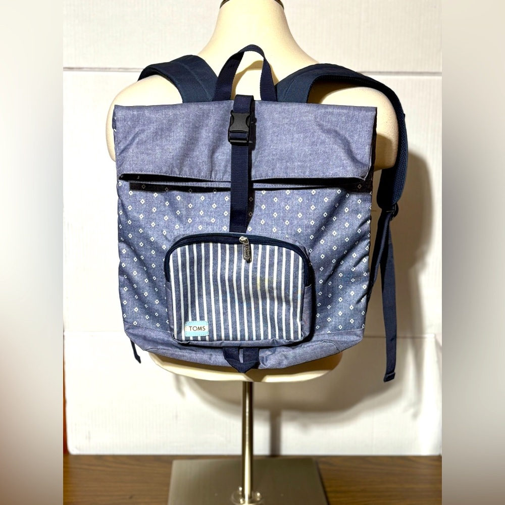 TOMS fold down anti-bullyingg backpackck Adjustablee shoulder strap top folds
